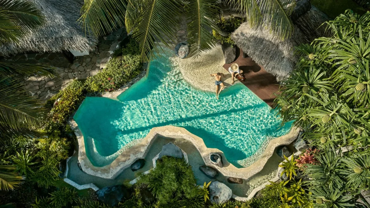 Aerial Poolside View at Como Laucala Island scaled Aerial view of poolside and tropical surroundings at COMO Laucala Island Fiji.