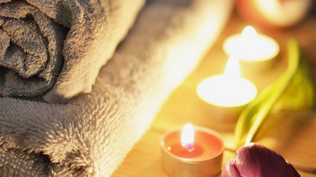andle-lit interior of the Coco Palm Massage Bure in the Yasawa Islands, Fiji