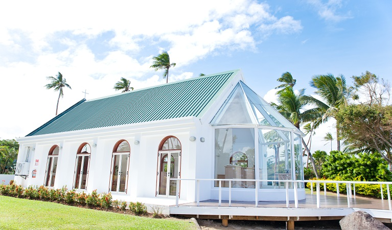 Exterior Seaside Chapel Exterior of seaside chapel with palm trees and ocean background at Coral Coast Fiji