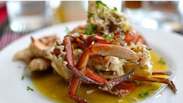 Gourmet fish dish served on a plate at Navutu Stars Restaurant in the Yasawa Islands, Fiji