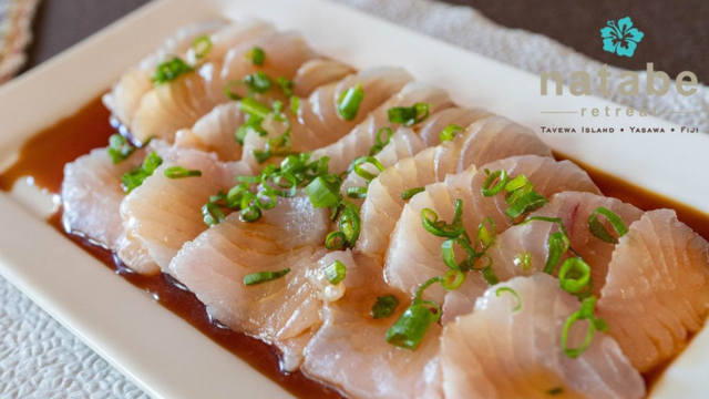 Plate of fish dish served at Natabe Retreat restaurant on Tavewa Island, Fiji.