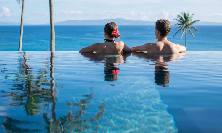 Poolside couple at Raiwasa Private Resort poolside couple raiwasa private resort