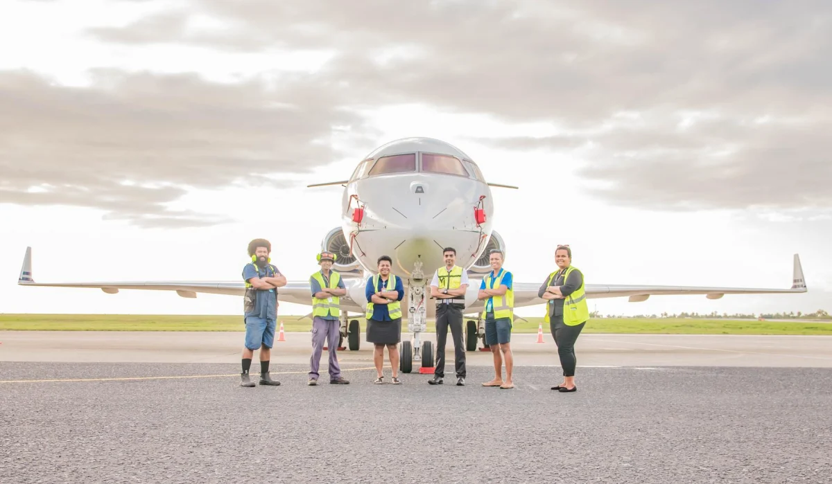 Sunflower Aviation 1 scaled Team of Sunflower Aviation with aircraft, celebrating ISO 9001:2015 certification.