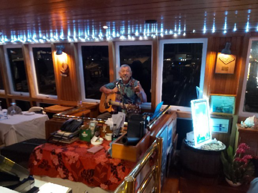 Tikos Floating Restaurant Musician tikos floating restaurant musician