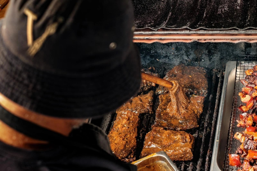 vasaqa fiji barbecue meats cooked by chef over the shoulder