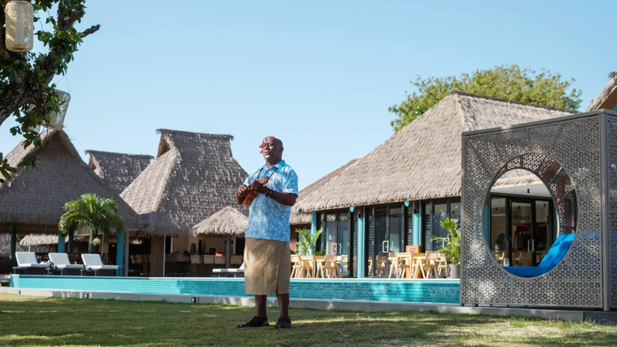 Yatule Resort Spa scaled Swimming pool with lounge chairs and tropical plants at Yatule Resort & Spa